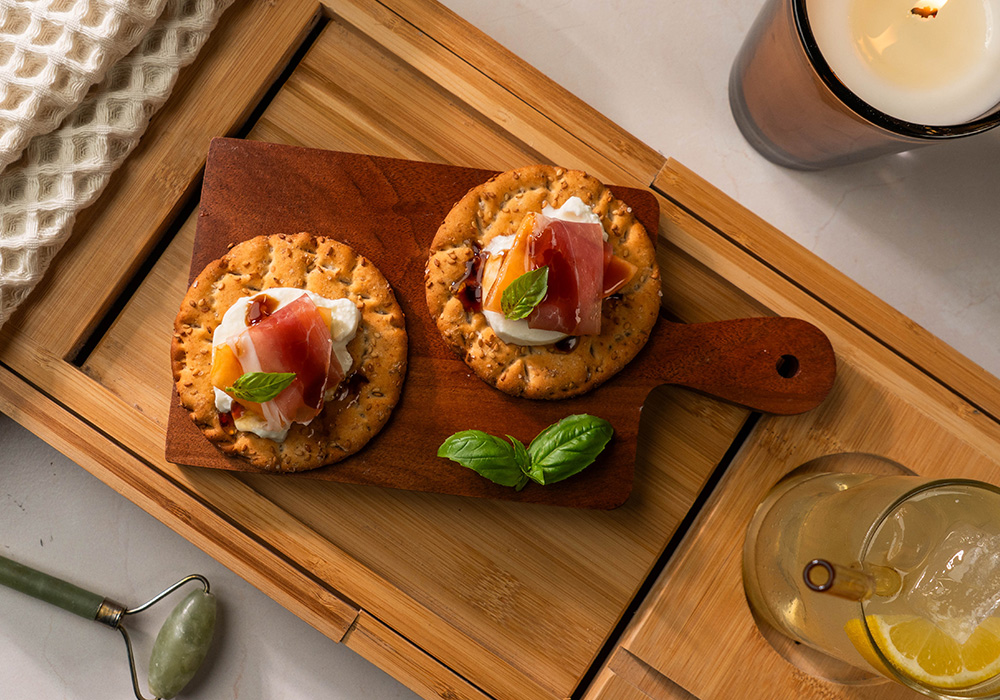 Wasa Sesame Crackers with Prosciutto, melon, and burrata