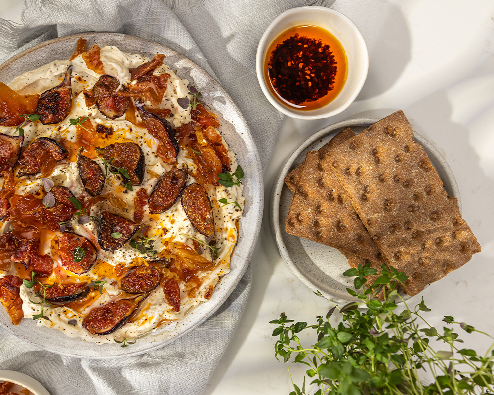 Wasa Sourdough Crackers with Goat Cheese, honey, fig, chili oil