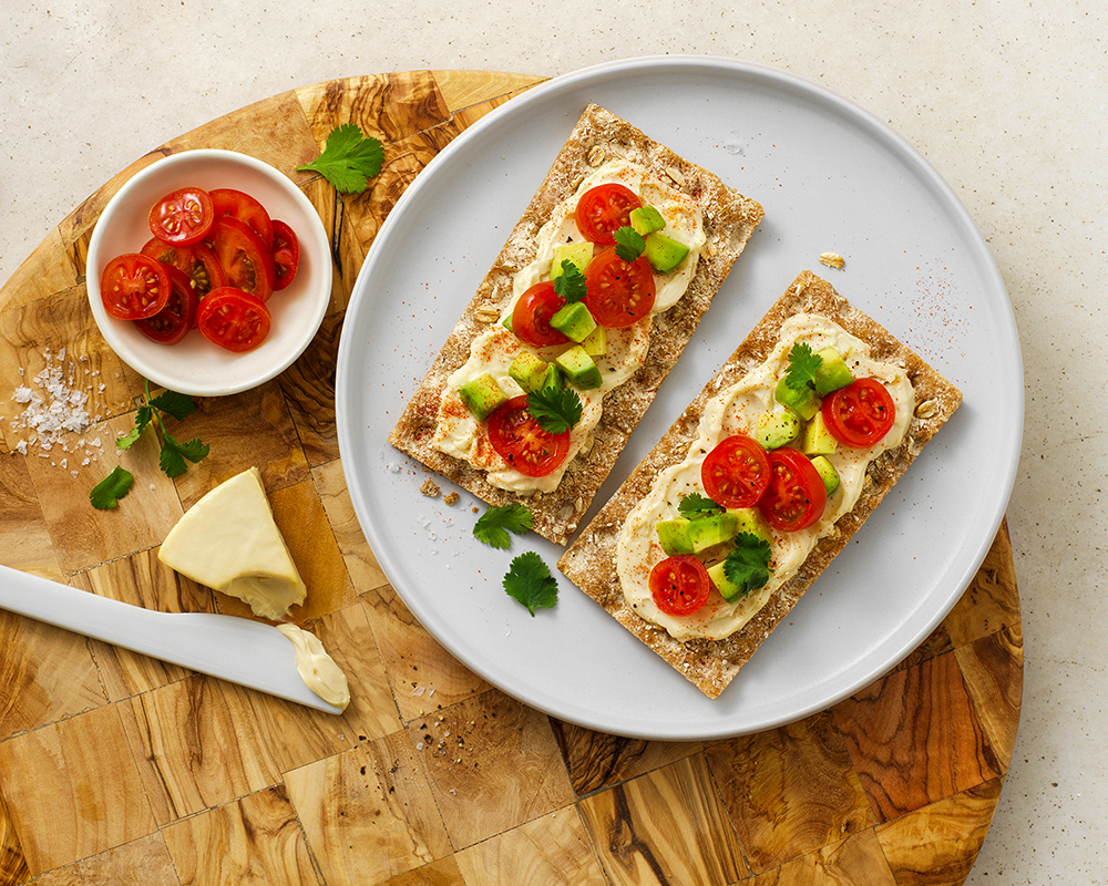 Avocado Tomato Cheese on Wasa Multigrain Crackers